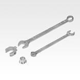 Combination spanner with protective caps